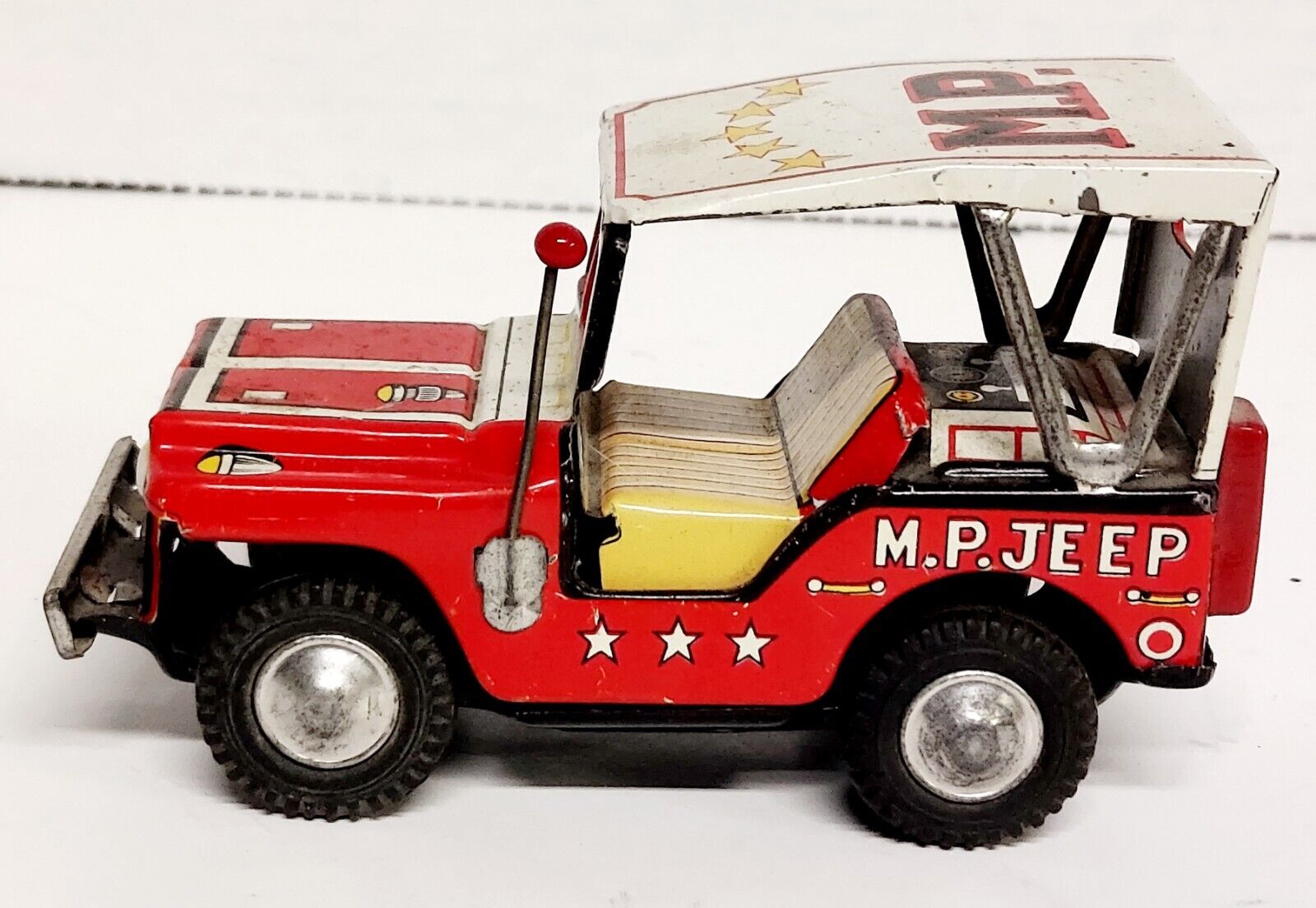 Vintage Japan 4” Tin Litho Friction M. P. Jeep Toy